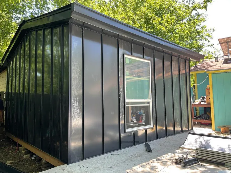 Black standing seam metal wall panels for Roof Inspection in Mobile